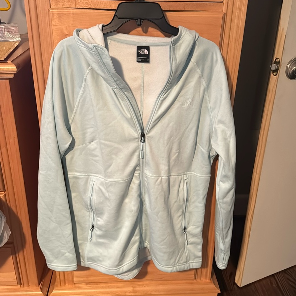 Light blue north face zip up